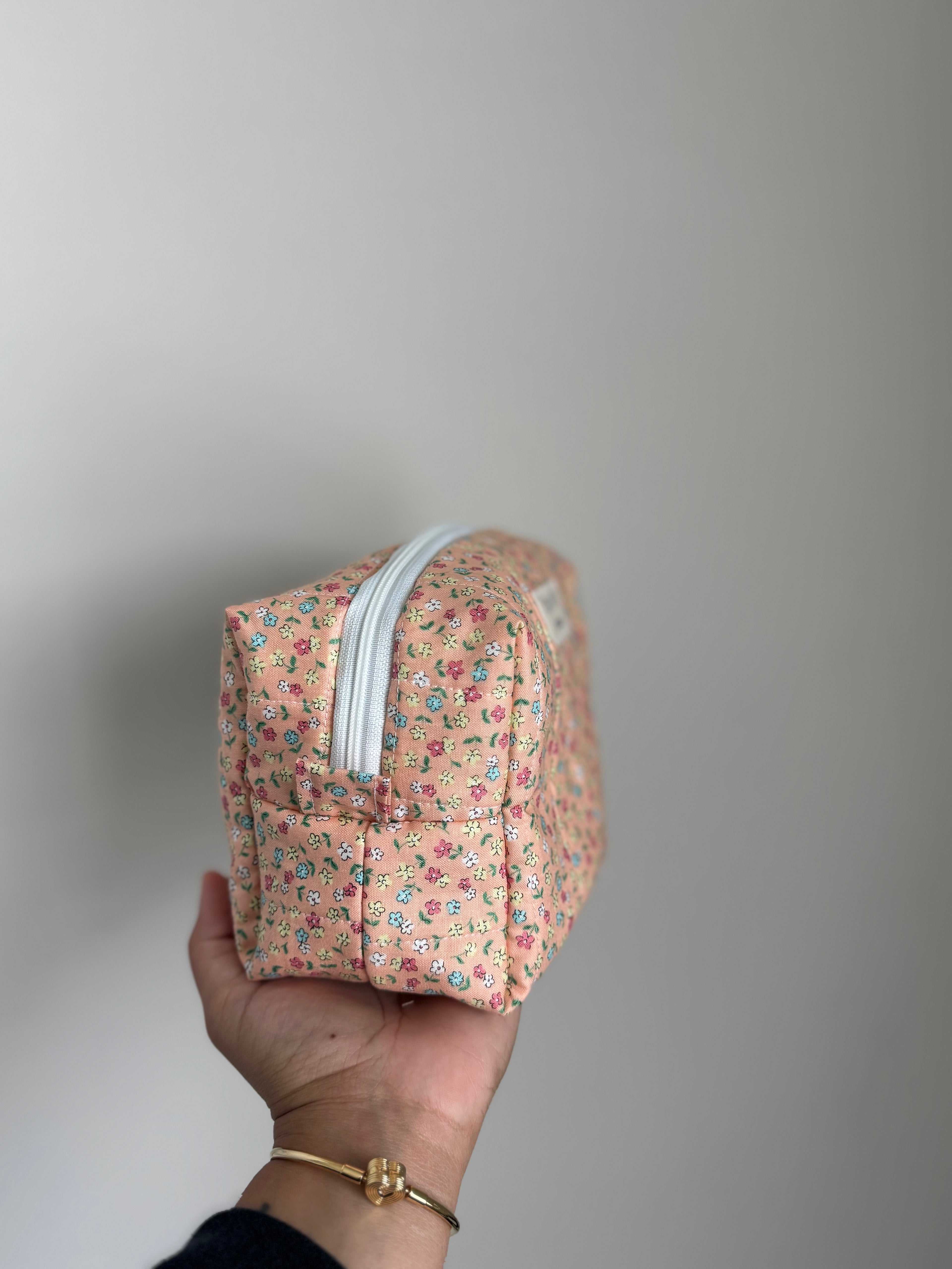 Pastel orange medium makeup bag