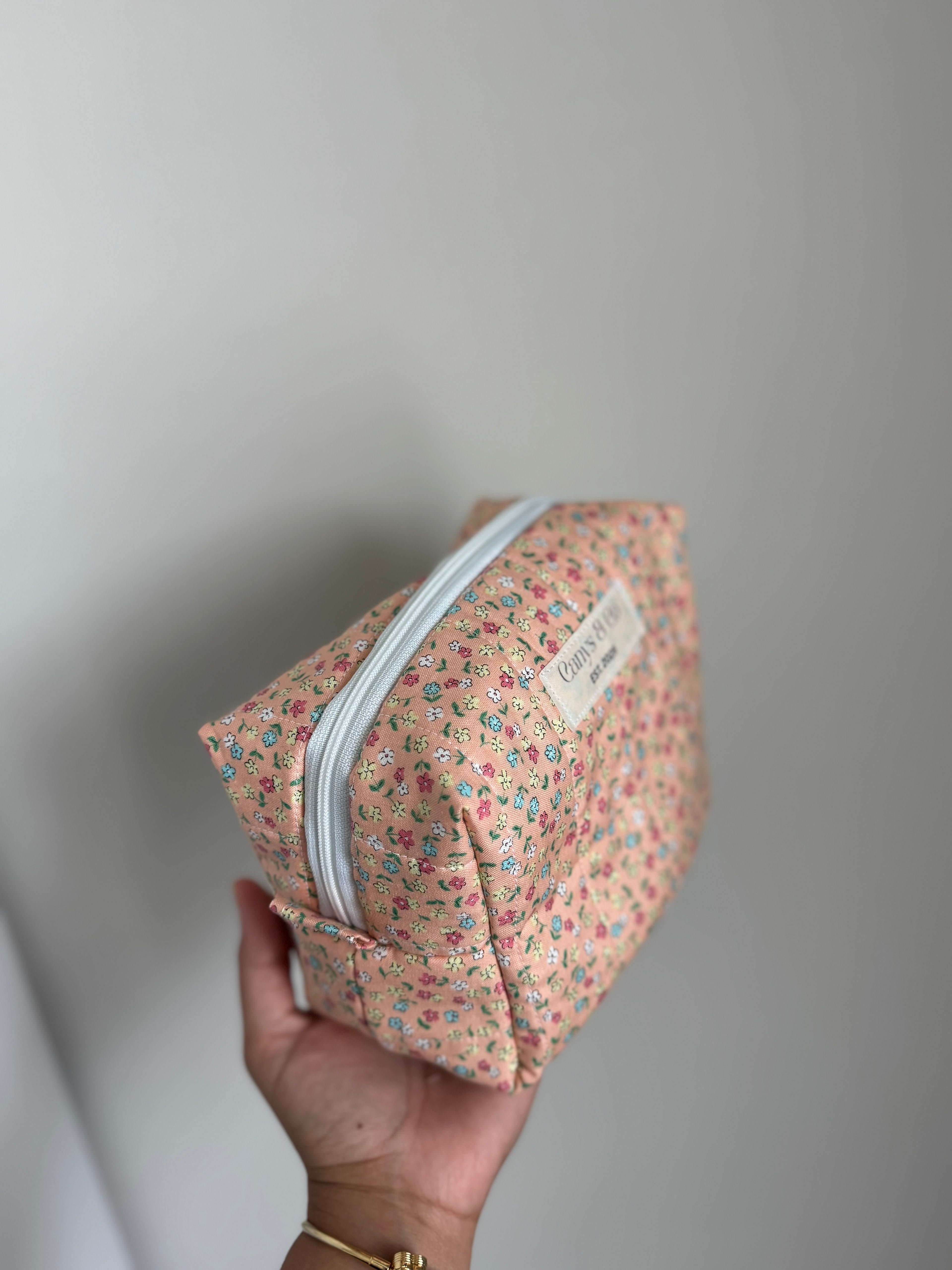 Pastel orange medium makeup bag