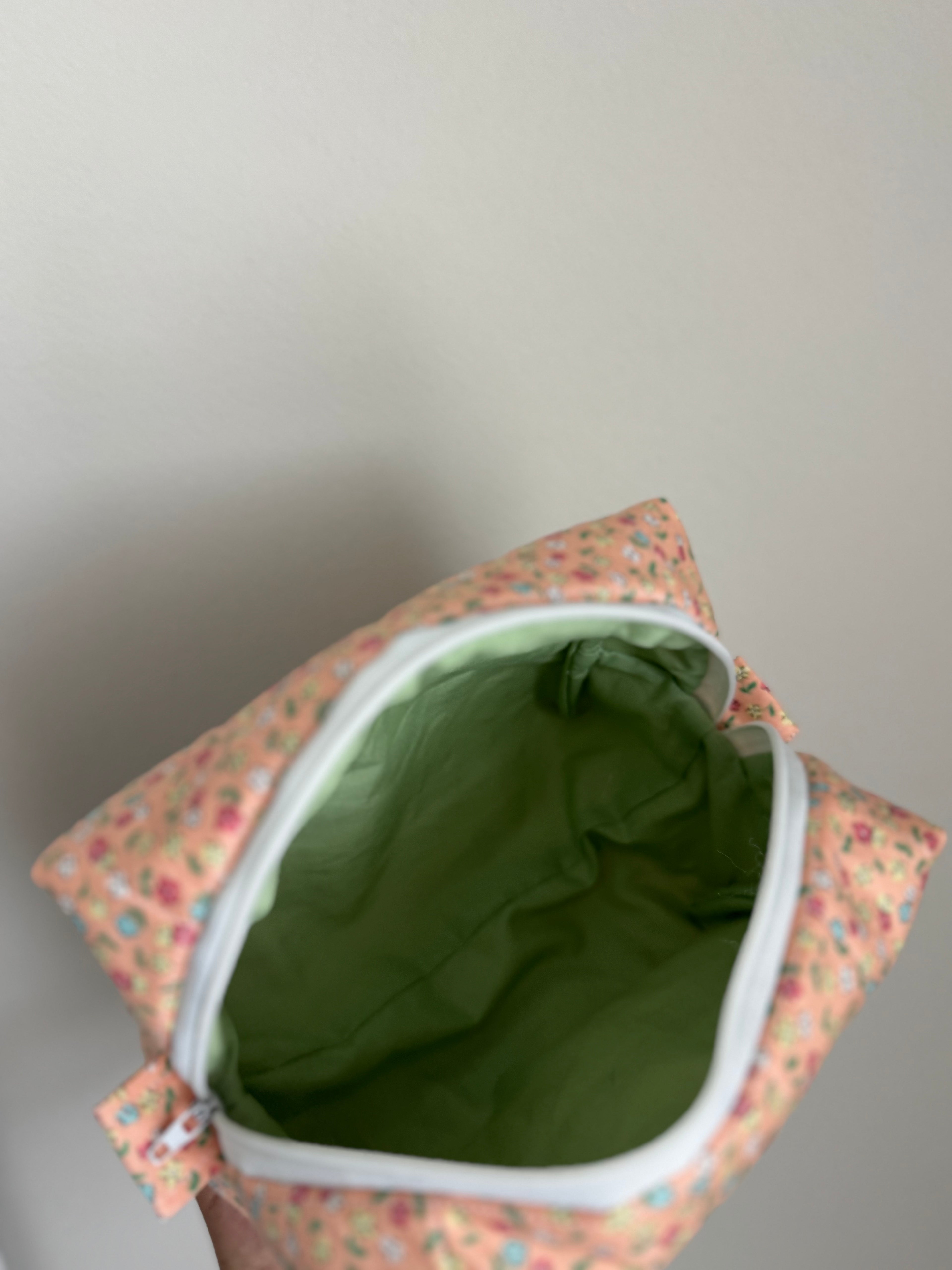 Pastel orange medium makeup bag